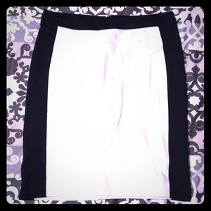 White skirt with navy color blocking.